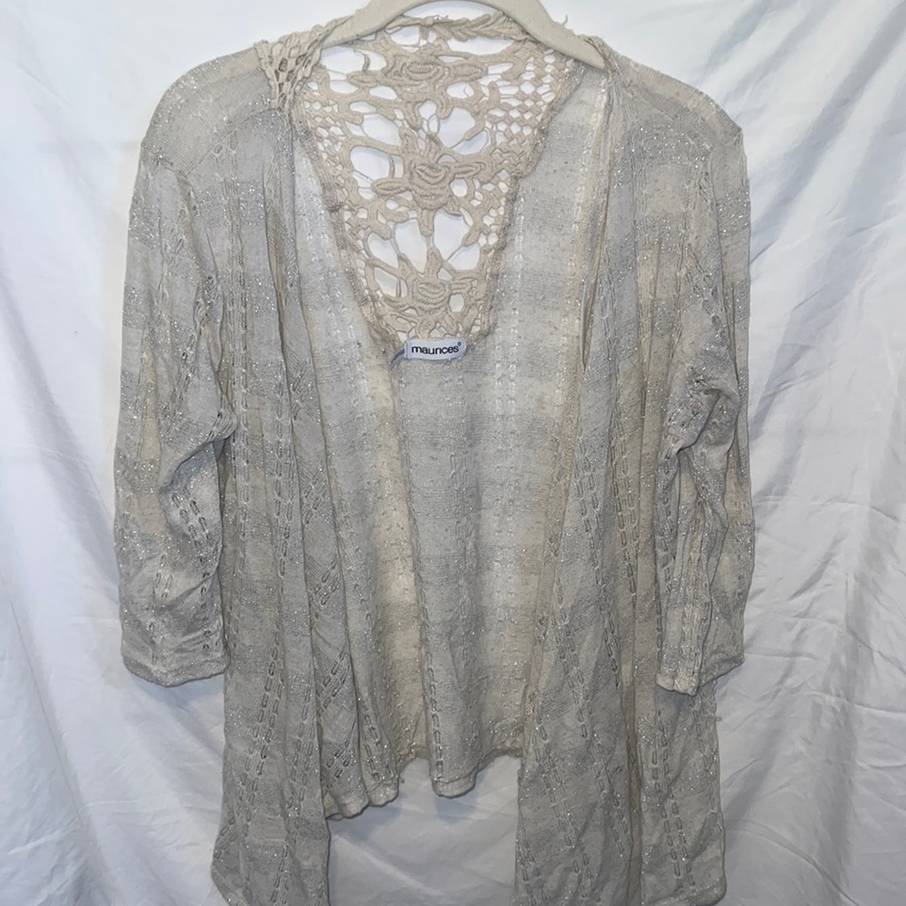 Maurice’s tan cardigan, with sparkle fabric and a knit pattern on the back